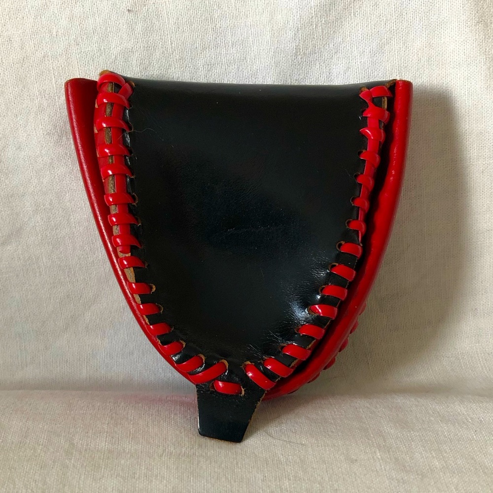 Red and black vintage leather coin purse.
